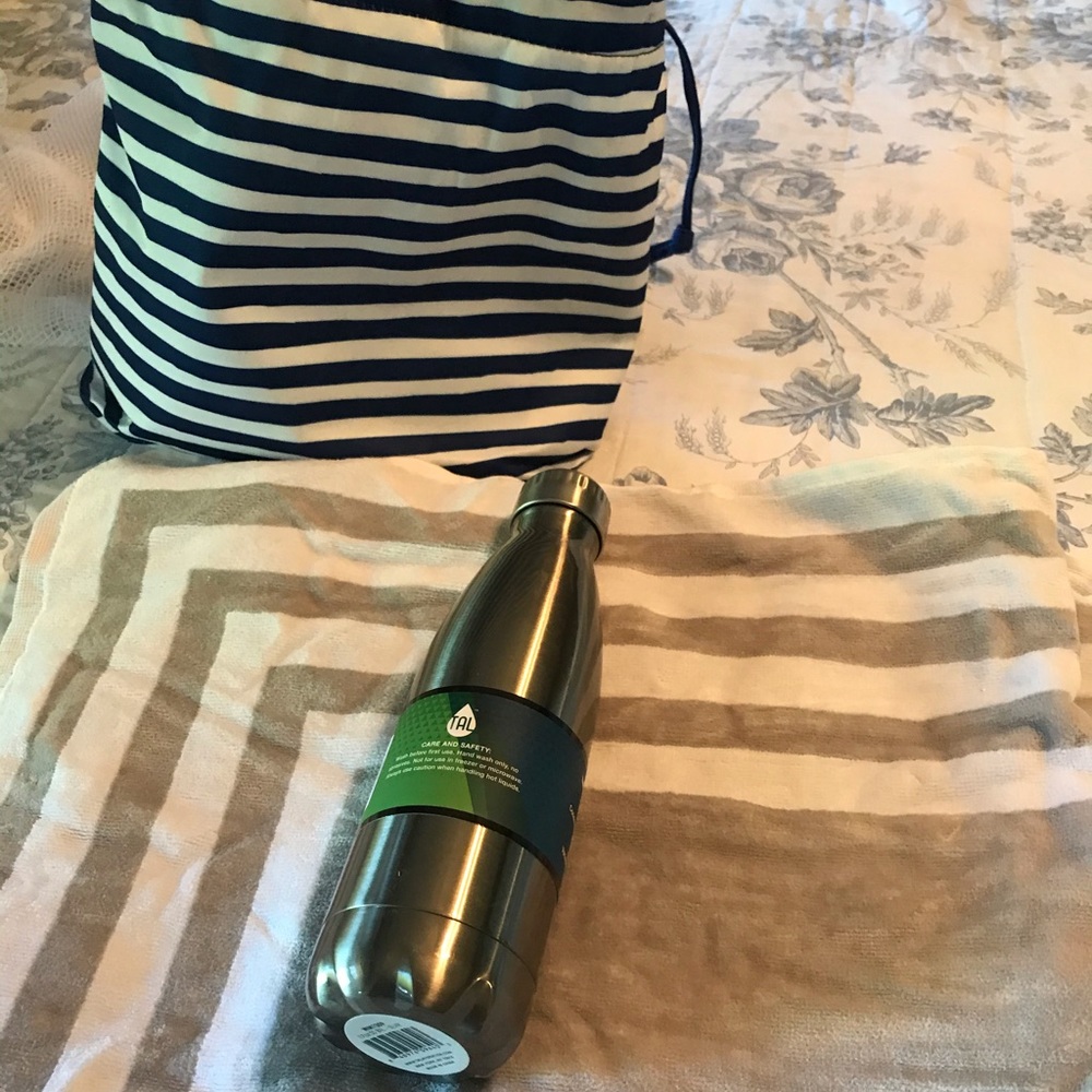 Beach bag with beach towel and water bottle